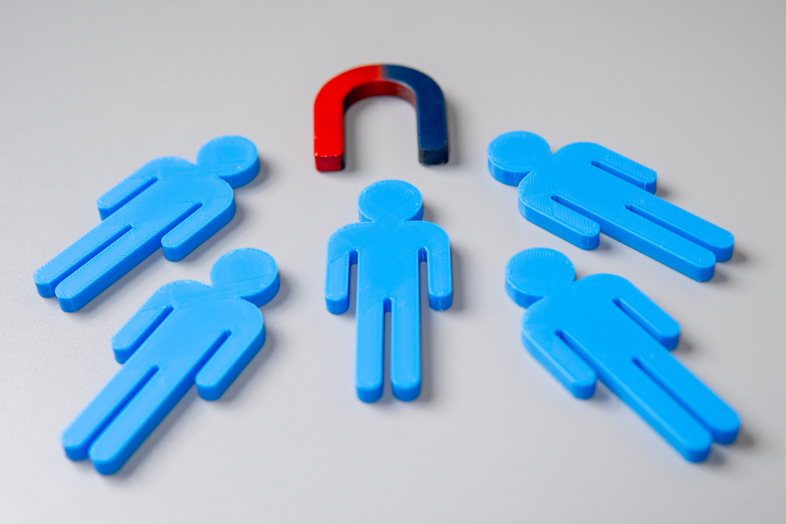 Magnet and blocks representing customer retention